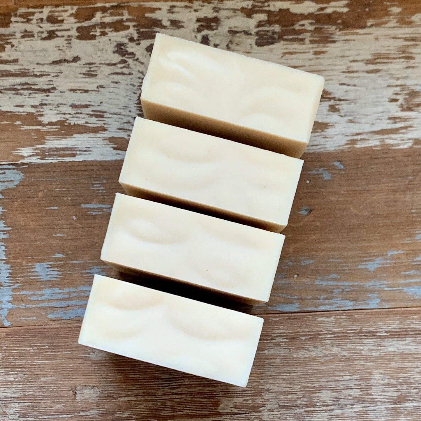 Top view of 4 bars of Simply Ewe sheep's milk soap